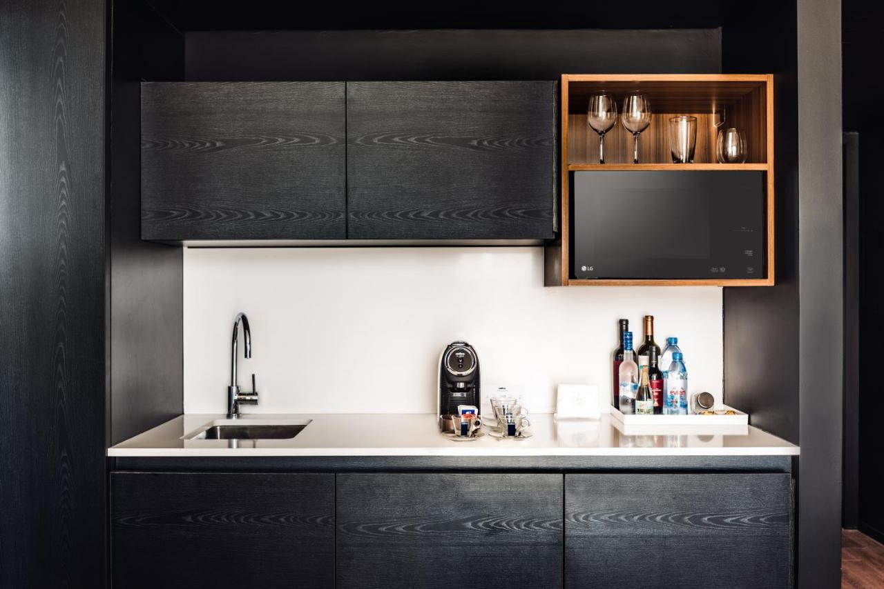 Sls Buenos Aires Puerto Madero 호텔 외부 사진 A wet bar in a hotel room